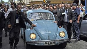 Mujica's VW Beetle and security detail